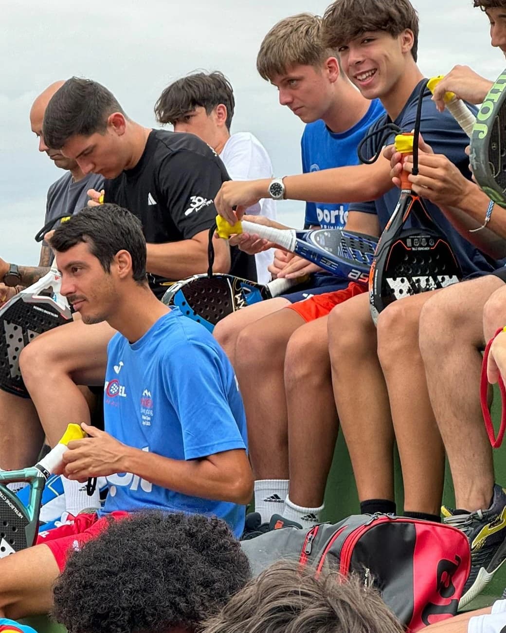 Players at the Valencian Padel Federation session fitting the Auro on their rackets